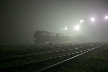 Gloomy railway in the fog, mist
