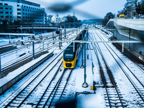 Nederlandse Spoorwegen - A Train Runs On A Snow