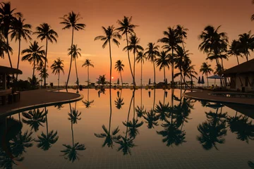 Foto op Plexiglas Sonnenuntergang am Pool © Philippe