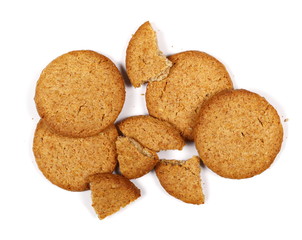 set round wholewheat biscuits with hazelnut isolated on white background