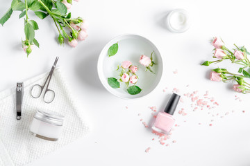 salt and cream for nail care in spa top view