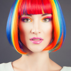 Fototapeta premium beautiful woman wearing colorful wig