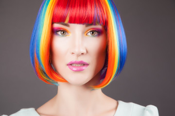 beautiful woman wearing colorful wig