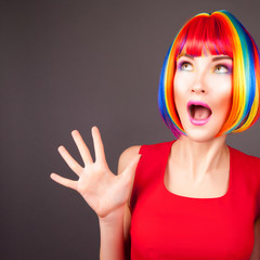 beautiful woman wearing colorful wig