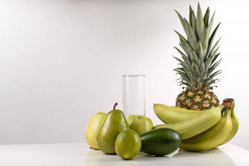 Collection of green fruits on a white background