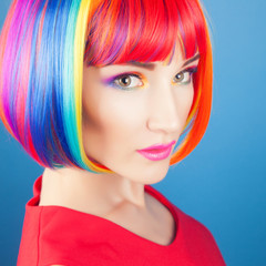 Fototapeta premium beautiful woman wearing colorful wig