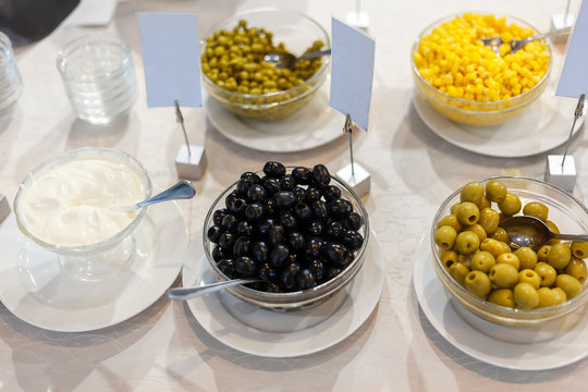 Breakfast buffet, olives, corn