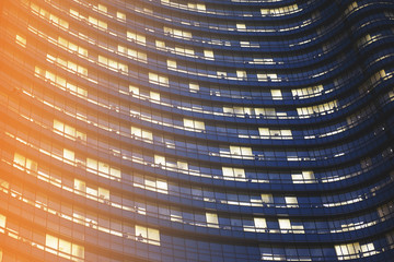 Business building glass with sun flare