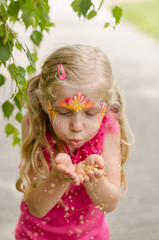 girl with colorful face-painting