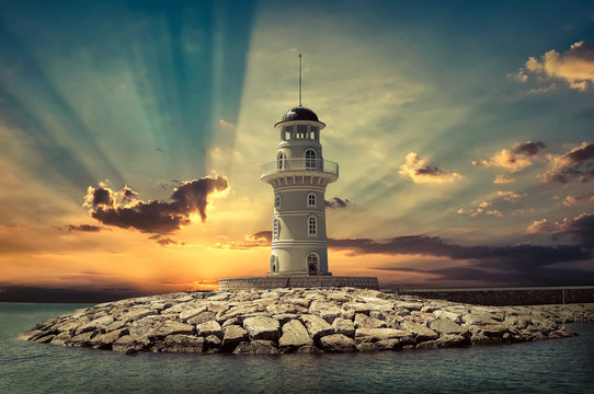 Fototapeta Lighthouse on the sea under sky.