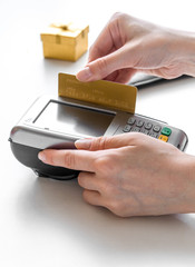 payment by card for gift in shop on white background