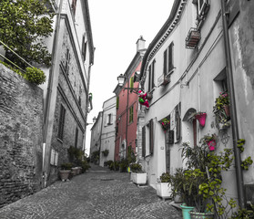 Fototapeta na wymiar Panoramic black and white view from an alley in Grottammare, Marche, Italy