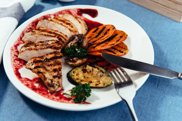 Grilled vegetables and chicken fillet. Traditional cuisine. Gril