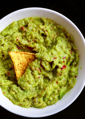 Guacamole with Chips in a bowl