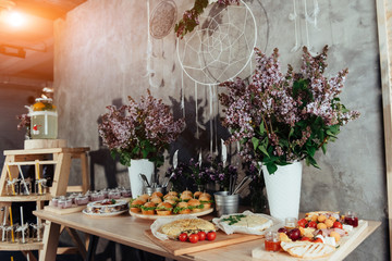 Canapes and drinks a desserts on the buffet table