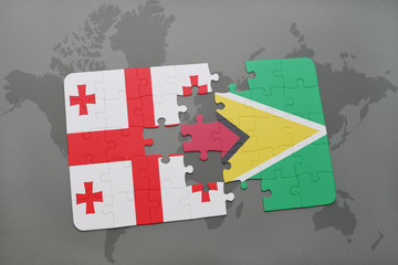 puzzle with the national flag of georgia and guyana on a world map