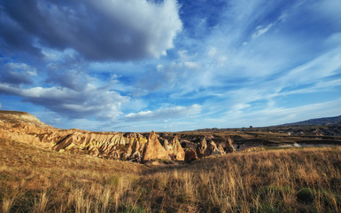 Unique geological formations in valley in Cappadocia