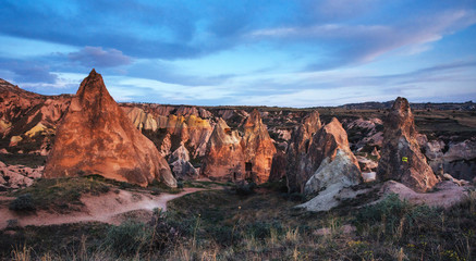 Fototapeta na wymiar Unique geological formations in valley in Cappadocia