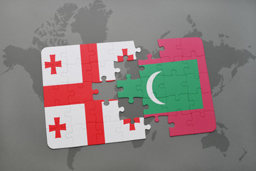 puzzle with the national flag of georgia and maldives on a world map