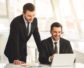 Handsome businessmen working