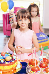 Children's funny birthday party in decorated room