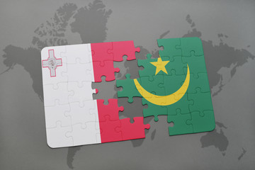 puzzle with the national flag of malta and mauritania on a world map