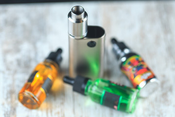 Jar with fluid for personal vaporisers and e-cigarette. Electronic nicotine delivery systems. ENDS.