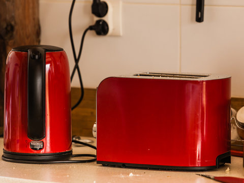 Electric kettle and toster on kitchen table