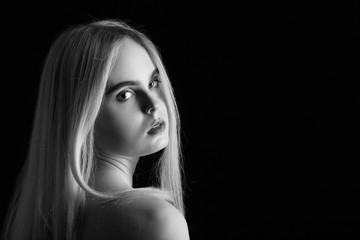 beautiful girl portrait with long blond hair, monochrome