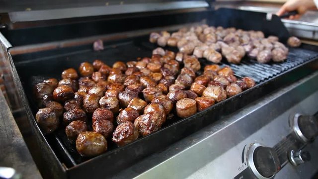 Grilled sausage cut in small pieces.