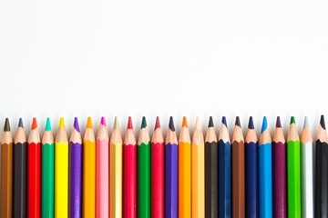 line of colored pencils with copy space. Colorful frame for text or artwork. 