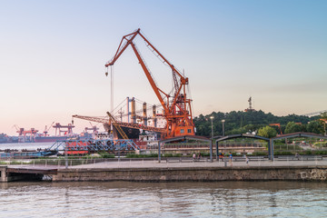 Cargo container ship at harbor in city of China.