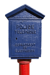 Vintage blue police call box on red pole. Isolated.