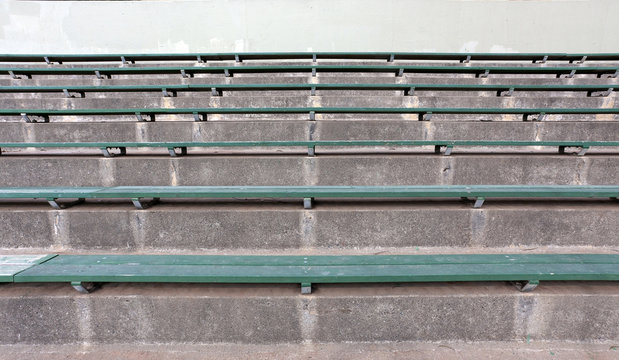 Wood and concrete sports' bleachers.