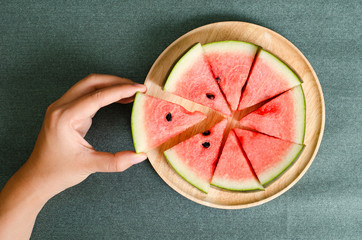 Sliced watermelon on wooden plate ready to eating,tropical fruit