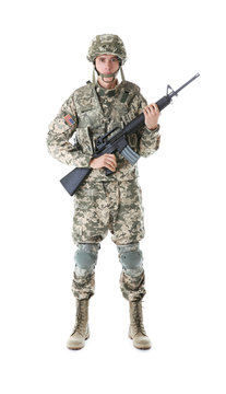 Soldier In Camouflage Holding Rifle, Isolated On White