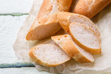 Warm french baguette at table