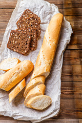 White , brown bread on paper