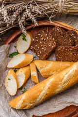 Cut bread in wooden bowl