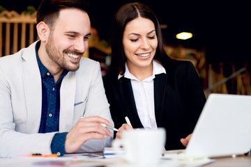 Business partners working in team, discussing issuesand sharing new ideas, having success. teamwork concept.