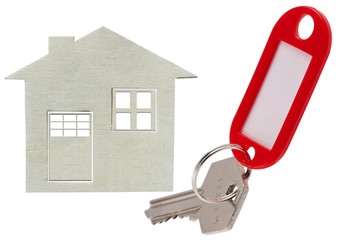 silhouette maison, clé avec porte-étiquette rouge 