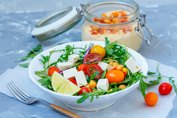 Healthy hummus, homemade chickpea and veggies salad, diet, vegan food, vitamin snack.