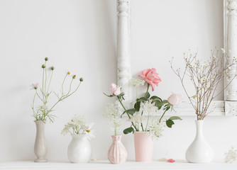flowers in a vase on white background