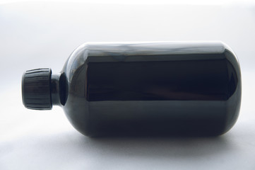 a black bottle on the table