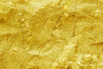 surface of the marble with gold tint