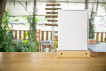 White label on the table. Stand for acrylic tent card Used for Menu Bar and restaurant or put everything into it . mockup