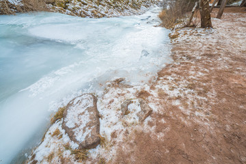 frozen brook in the mountains