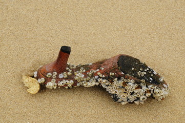 Many kind of rubbishes on the beach.