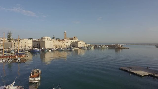 Flight over a port of a small town in south Italy 