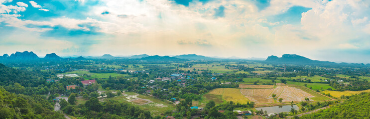 Amazing picture of green mountain landscape with blue sky and white clouds. Great nature scenery of green mountain range under sunlight at the middle of summer day